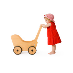 stock-photo-11215617-girl-and-toy-wagon-baby-carriage-toddler-child-pushing